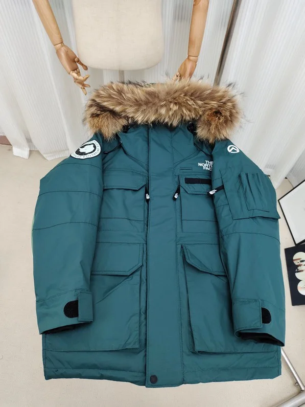 The North Face Summit Series White Duck Down Parkas