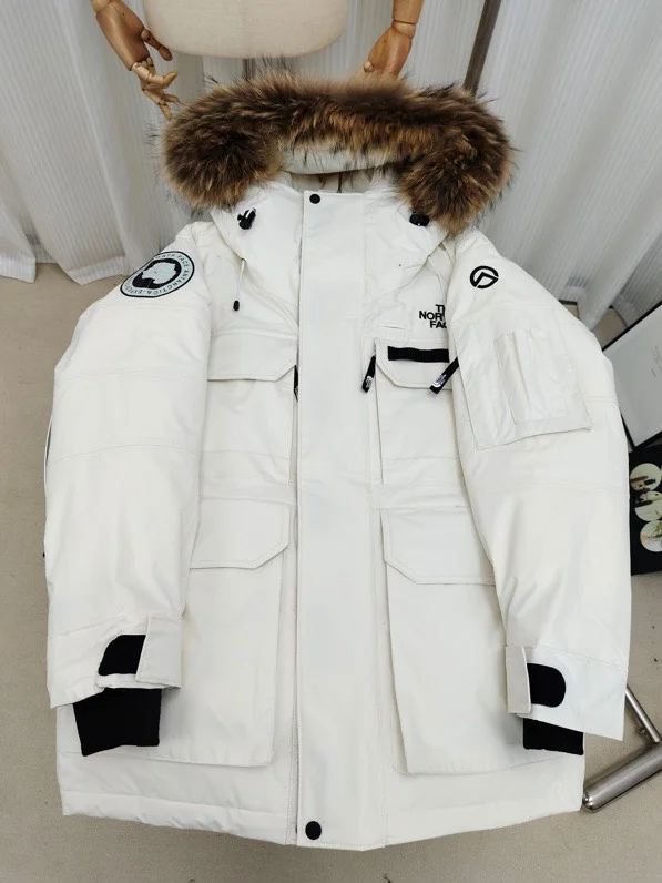 The North Face Summit Series White Parkas