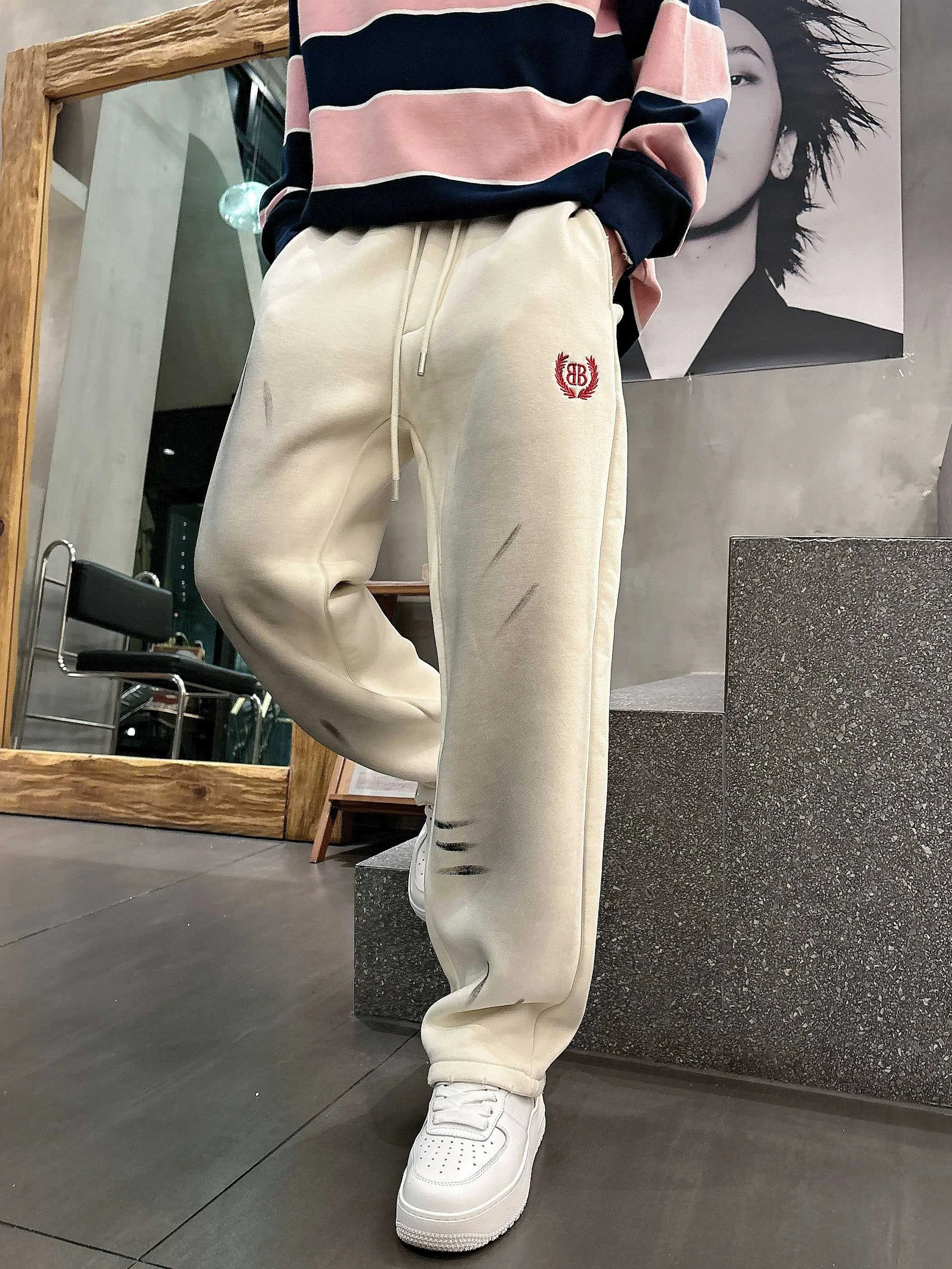 Balenciaga 2025 Autumn Winter Beige Casual Pants with Red Classic Logo Embroidery